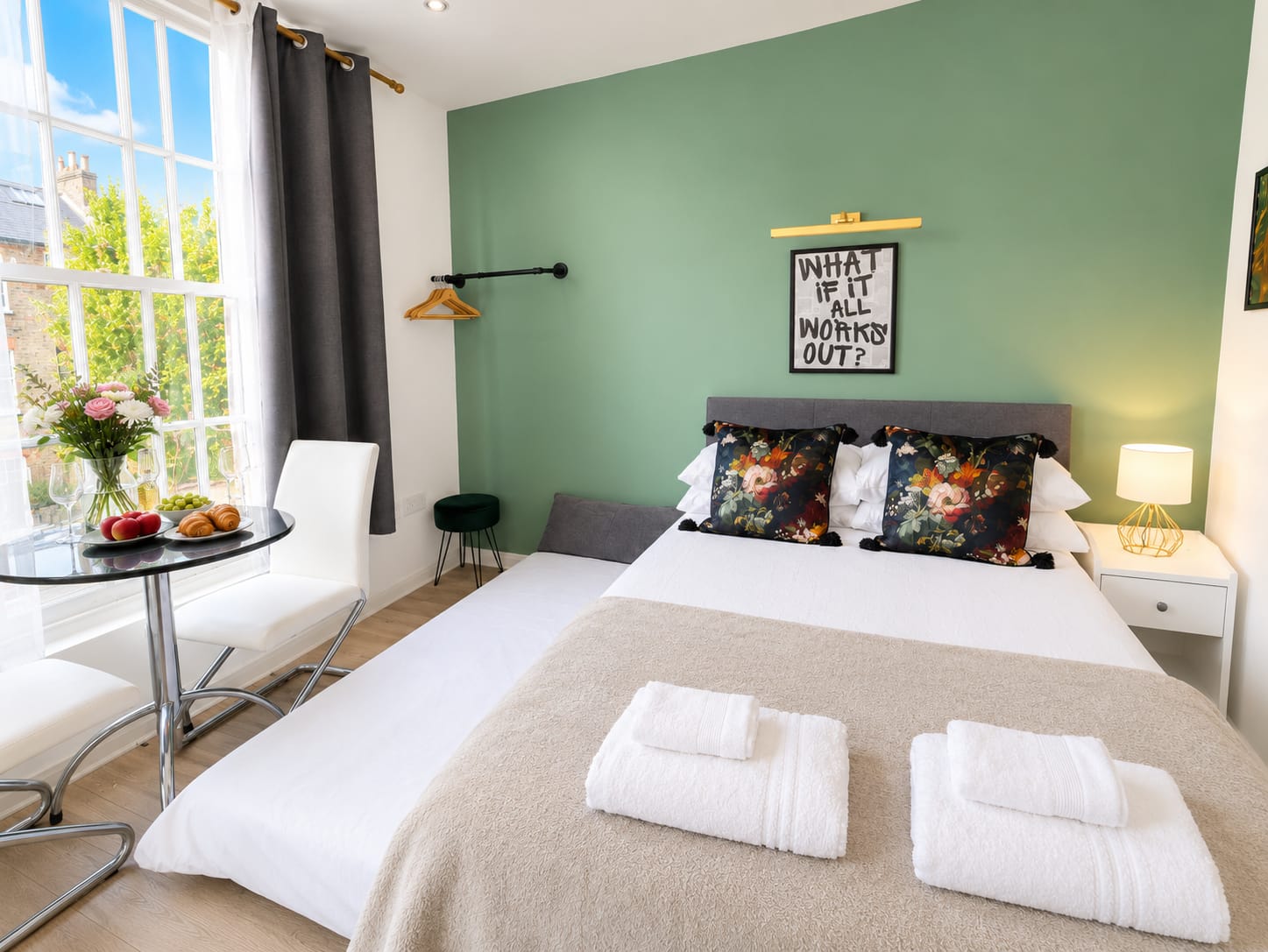 The Islington Retreat studio with double bed, dining table and bay window